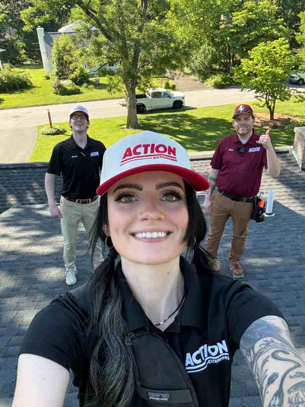 Action Exteriors team on a roof